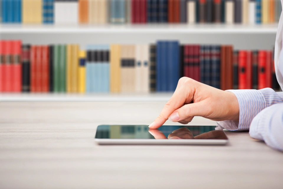 A person using an iPad eSIM plan